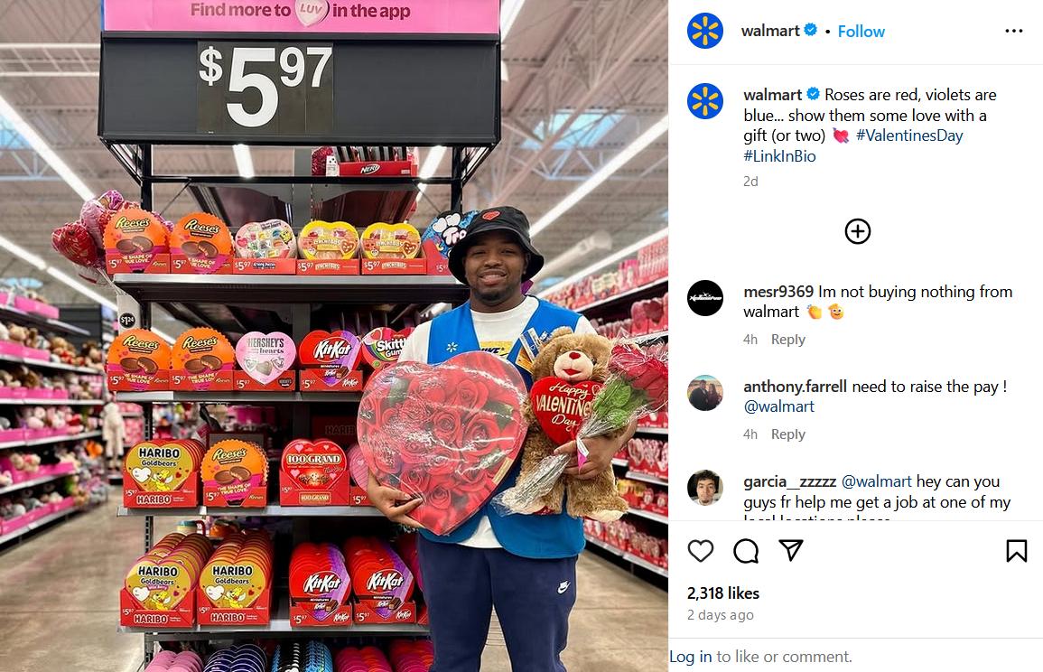 Choose Between Micro And: What Small Businesses Get Wrong image A Walmart employee holds a teddy bear, flowers, and a heart-shaped candy box in front of a Valentine