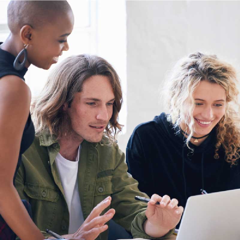 Students collaborating on a tablet device